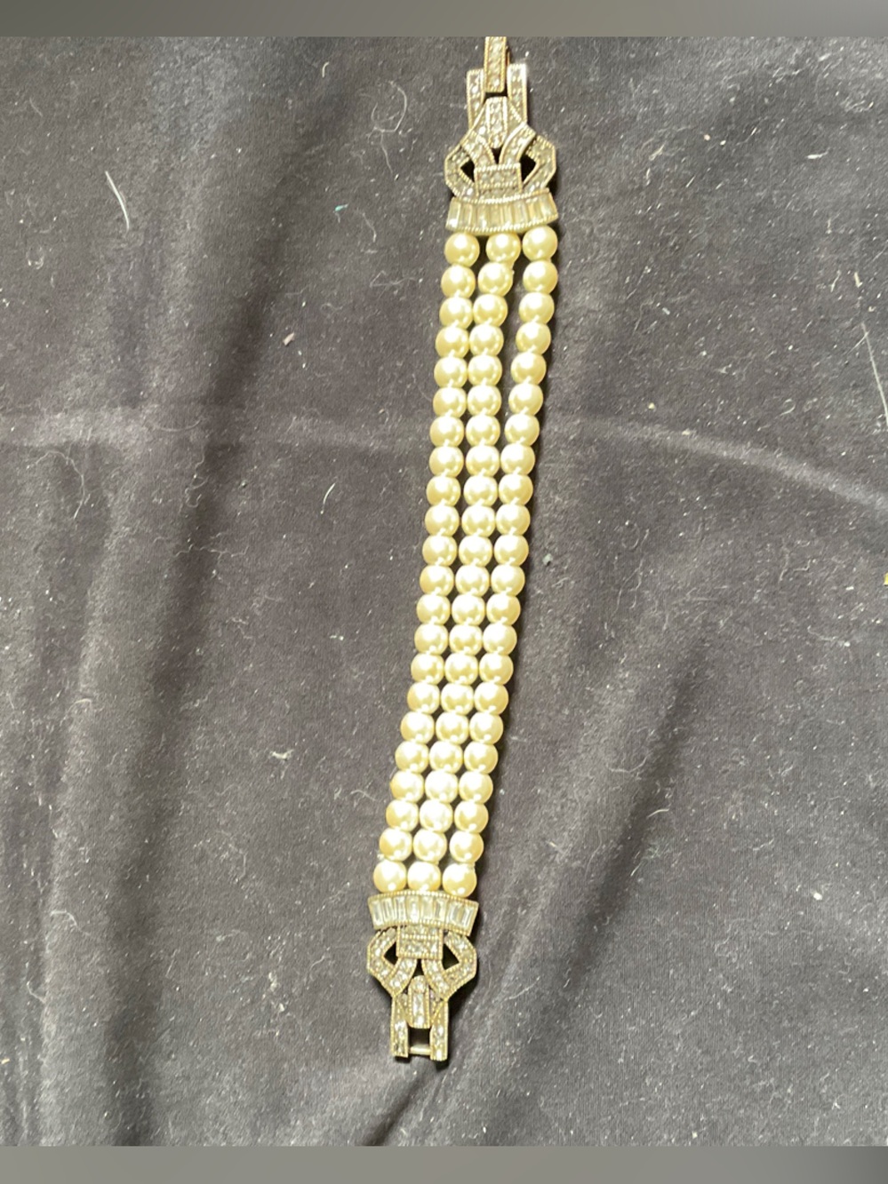 Heidi Daus Four-Strand Ivory Pearl Bracelet with Gold-Tone Rhinestone Clasp